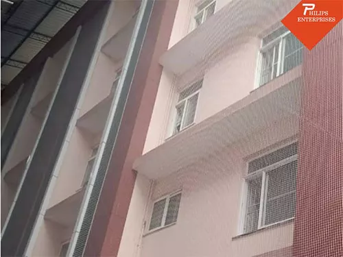 Completed bird protection net installed on balcony