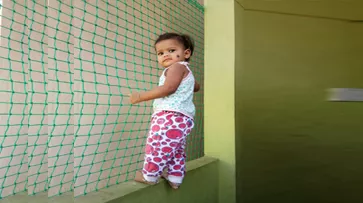 Children safety net installation on a residential balcony in Hyderabad
